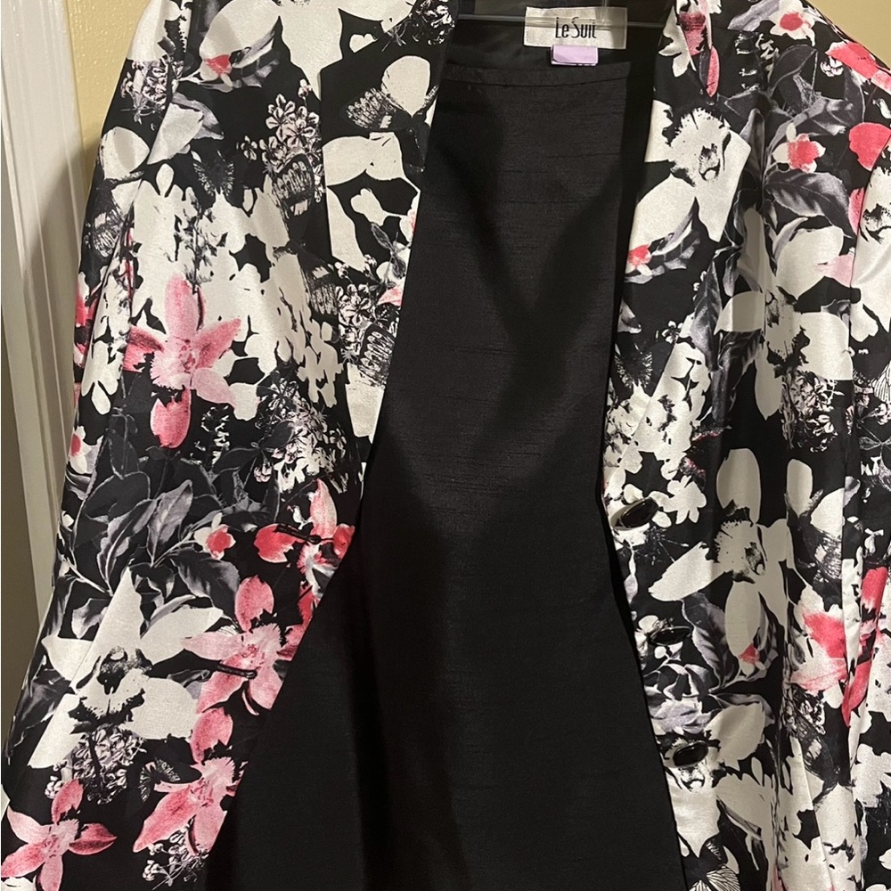 Floral jacket with a black skirt
